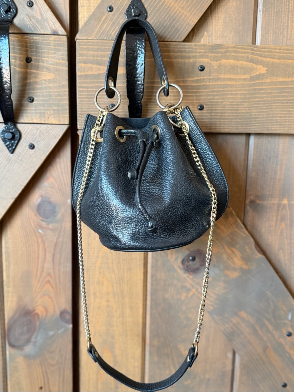 Black Leather Drawstring Shoulder Bag with Gold Hardware
